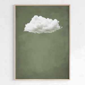 Peut inclure: Un seul nuage blanc sur un fond vert uni. Le nuage est en haut au centre de l'image.