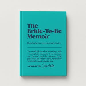 May include: A teal hardcover book titled The Bride-To-Be Memoir with dark blue text. The cover includes a phonetic pronunciation, a definition of the title, and the text A memoir by: Charlotte in a script font at the bottom of the front cover.