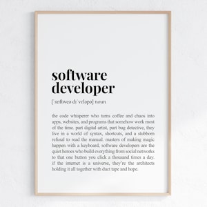 Peut inclure: Impression encadrée avec la définition de "développeur logiciel" en texte noir sur fond blanc. La définition comprend la prononciation phonétique et une description du rôle, soulignant leurs compétences et leur impact.