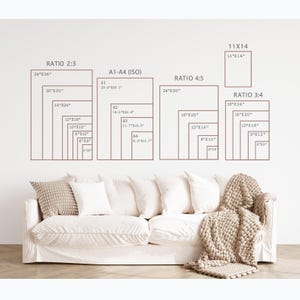 May include: A white sofa with several throw pillows and a beige knitted blanket. Above the sofa, various rectangular outlines display print sizes, including 24"x36", 20"x30", and 16"x24", with aspect ratios like 2:3, 4:5, and 3:4.
