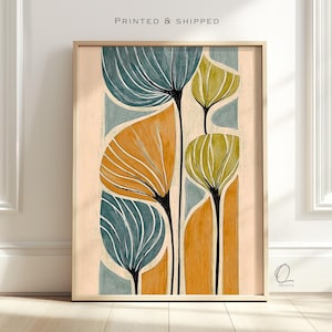May include: A vertical wall art print featuring stylised floral shapes in shades of teal, mustard yellow, and olive green against a light beige background. The design includes thin black stems and textured brushstroke details. The text PRINTED & SHIPPED appears at the top.