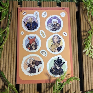May include: Six round stickers featuring illustrations of anime characters enjoying summer vacation. The stickers are on a peach-colored background with a white border. The text "Sweet Summer Vacation + Food & Drinks" is at the top of the sheet.