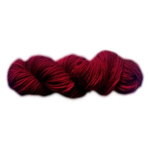 May include: A skein of deep red yarn, tightly wound and textured. The yarn appears soft and is suitable for knitting or crocheting projects. The color is a rich, saturated shade, ideal for creating warm garments or accessories.
