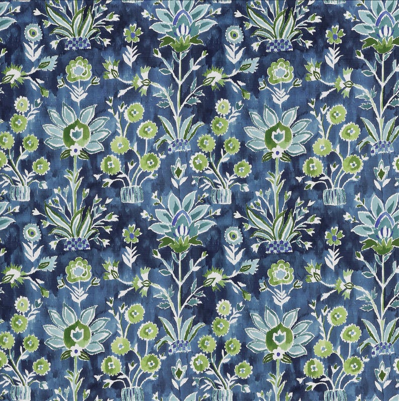 May include: A repeating pattern of stylized floral designs in shades of blue and green on a dark blue background. The design features large, ornate flowers and smaller, more delicate blossoms, creating a textured, artistic look.