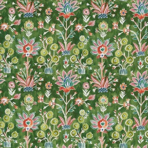 May include: A repeating pattern of stylized floral designs in shades of green, pink, orange, and blue. The design features large, ornate flowers and smaller floral accents on a textured green background, creating a vibrant and detailed textile pattern.