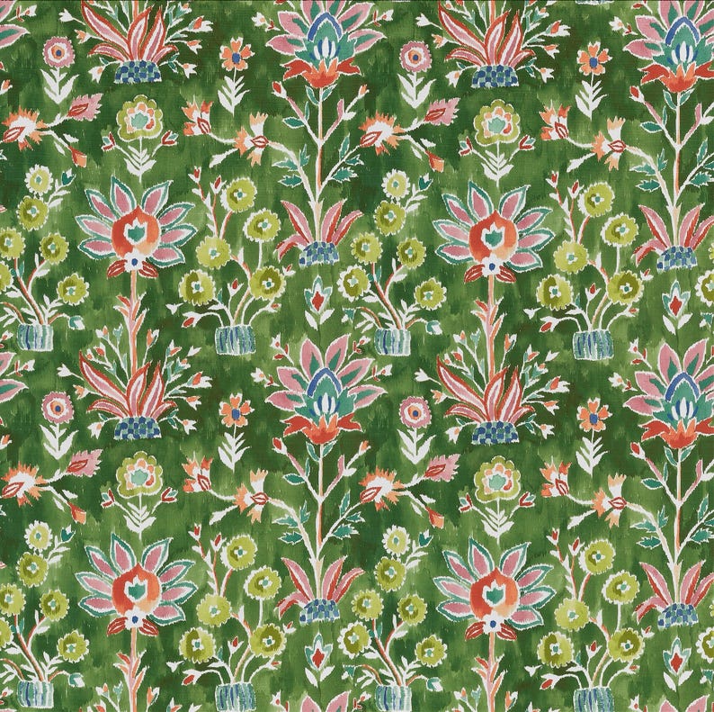 May include: A repeating pattern of stylized floral designs in shades of green, pink, orange, and blue. The design features large, ornate flowers and smaller floral accents on a textured green background, creating a vibrant and detailed textile pattern.