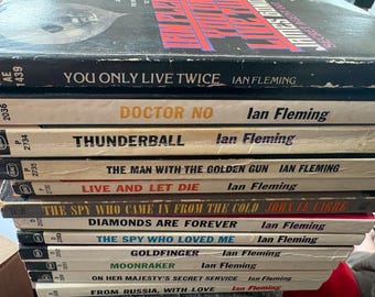 Vintage Ian Fleming 007 James Bond 1950s-60s Signet Novels (11) with a bonus spy Novel
