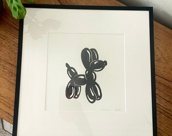 Linoleumprint met ballonhond: handgeperste linoleumprint