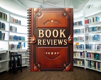 May include: A spiral-bound notebook with a brown, leather-textured cover featuring the embossed text "BOOK REVIEWS" in large capital letters, a star icon, and five stars at the bottom, with metal corner accents and a black wire binding.