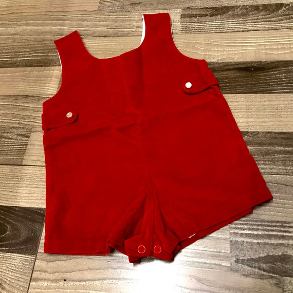 red baby jumper