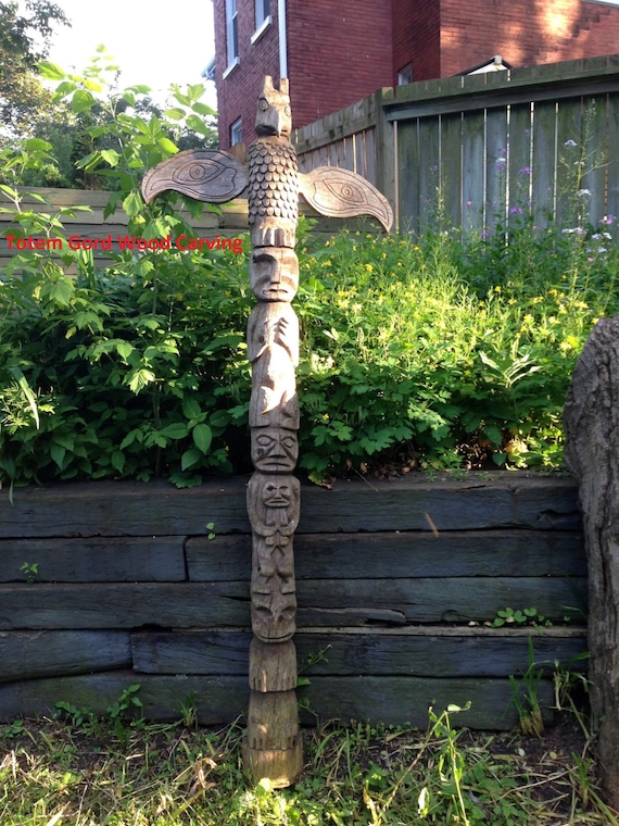 Totem pole hand carved 8 feet makes great gift  Each totem is custom carved and will vary from original photo free shipping