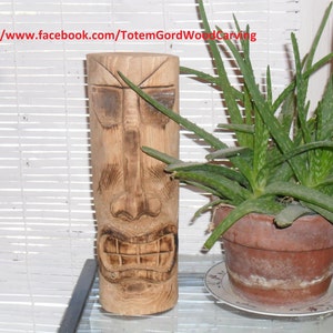 Tiki Head hand carved 12 inch tall with a ferocious smile to be a great conversation starter