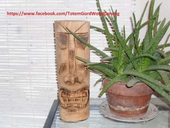 Tiki Head hand carved 12 inch tall with a ferocious smile to be a great conversation starter