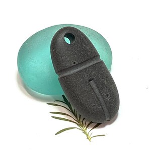 Carved Pebble Pendant
