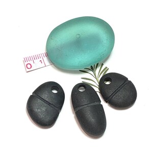 Carved Pebble Pendants