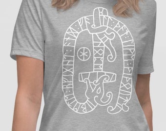 May include: A gray t-shirt with a white outline of a sword surrounded by runes. The runes are in a circle around the sword.
