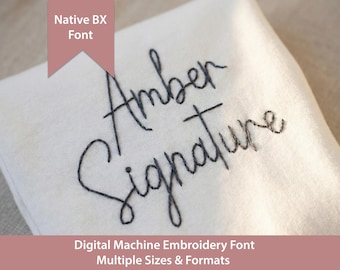 May include: A digital machine embroidery font displayed on white fabric, featuring the black stitched text Amber Signature. A pink banner at the top reads Native BX Font, and a pink banner at the bottom reads Digital Machine Embroidery Font Multiple Sizes & Formats.