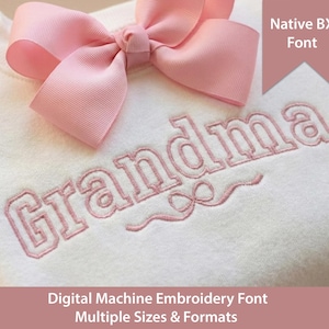 May include: A white sweatshirt embroidered with the word "Grandma" in pink, and a large pink bow. The image also includes text that reads "Native BX Font" and "Digital Machine Embroidery Font Multiple Sizes & Formats."