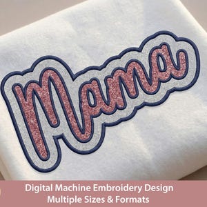 May include: An embroidered design featuring the word "Mama" in a glittery pink font, outlined in navy blue and gray, set against a white fabric background. The design is for digital machine embroidery and comes in multiple sizes and formats.