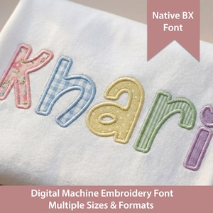 Pode incluir: Nome bordado "Khari" em uma fonte lúdica, com padrões florais, xadrez e listrados em rosa, azul, amarelo, verde e roxo. O texto "Native BX Font" e "Digital Machine Embroidery Font" também são visíveis.