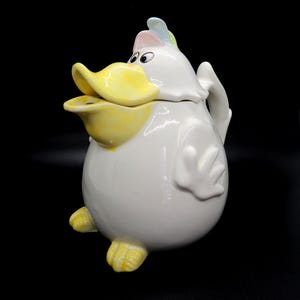 May include: A rustic wooden sign with the text "Welcome to our home" in white lettering. The sign features a distressed finish and a simple, inviting design, perfect for entryway decor.