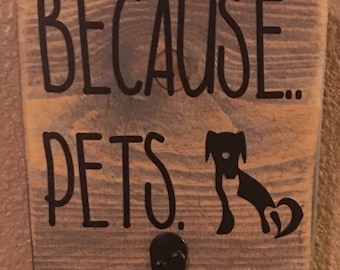 Because.. Pets. lint roller sign with hook