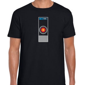 May include: Black t-shirt featuring a graphic of HAL 9000 from the film 2001: A Space Odyssey. The graphic is a stylised representation of the computer's red eye.