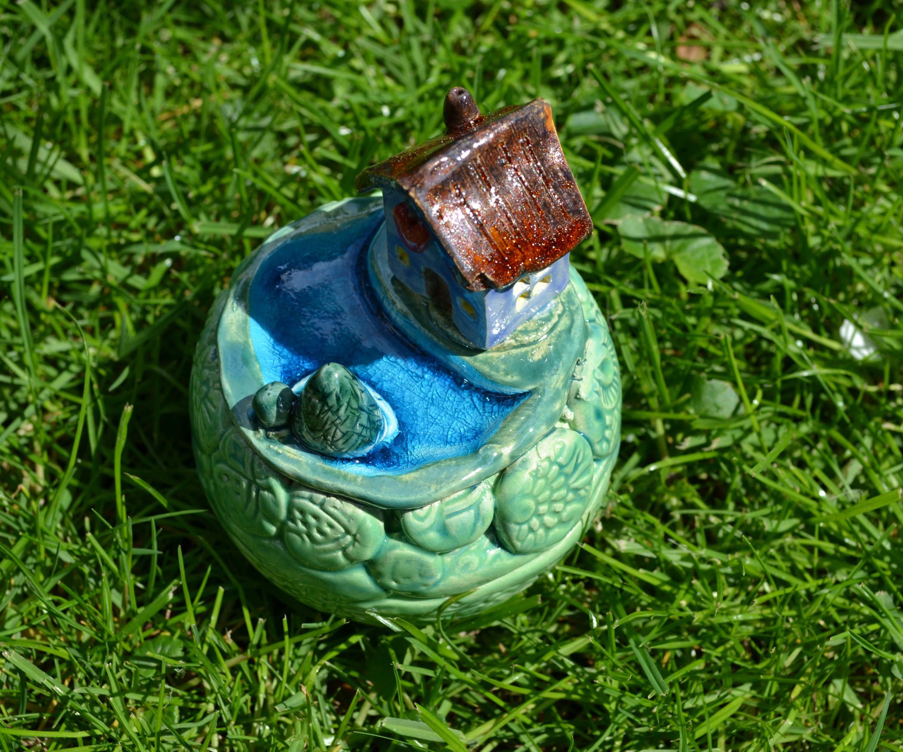 Ceramic garden ball Little worldhouse by the lake