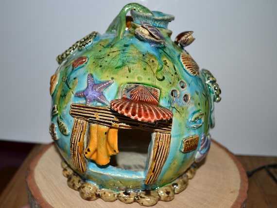 Ceramic stand house, shells on elf house