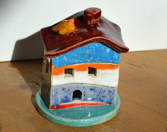 Small ceramic incense cone house