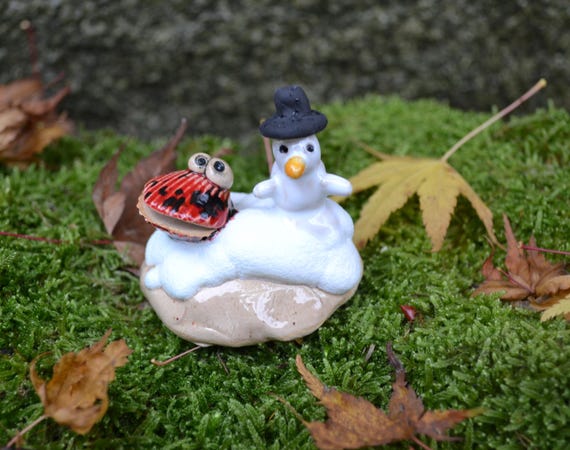 Ceramic shell Kanani with snowman Herbert in the snow
