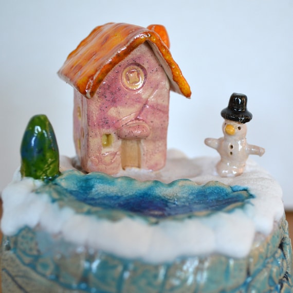 Ceramic garden ball "small world - house with snowman by the lake"