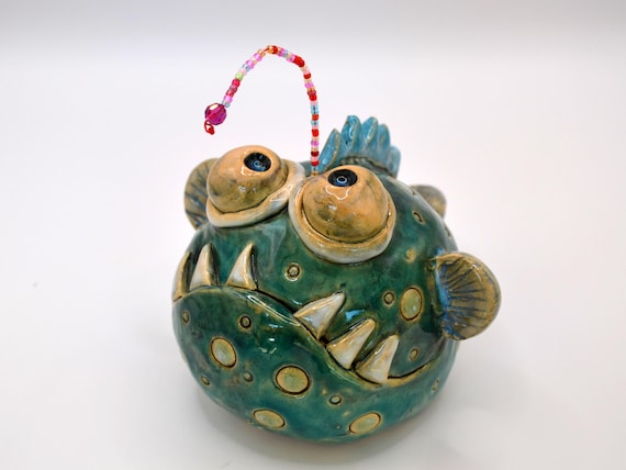 Ceramic anglerfish Mathias with shell Louie