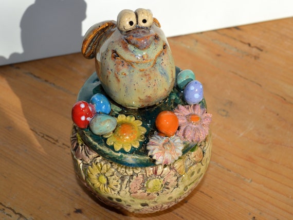 Ceramic garden ball "Easter Bunny Sönke" in the flower field
