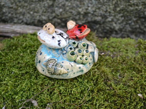 Ceramic shell on stone Freja & Lars