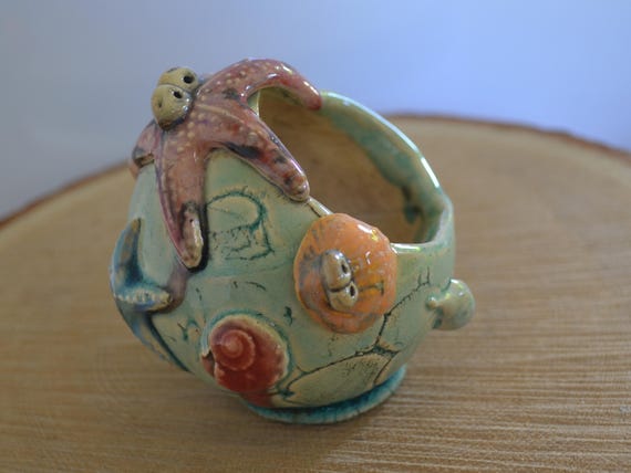 Ceramic plant sphere "Seashells on the beach"