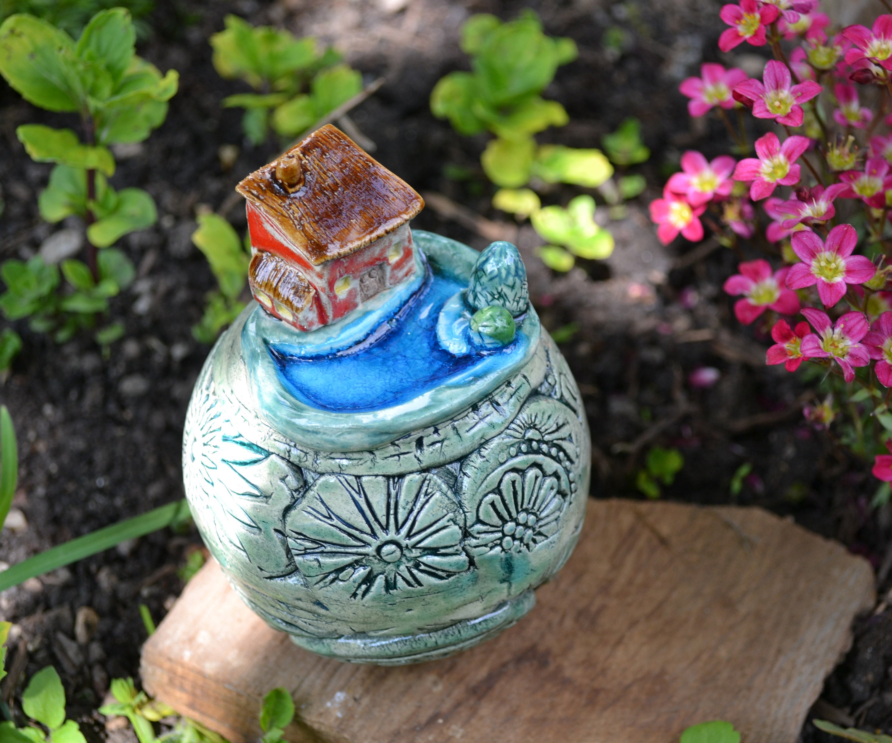 Ceramic garden ball Little worldhouse by the lake