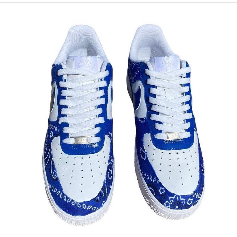 nike air force 1 black with gold swoosh