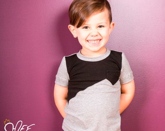 Plain asymmetrical t-shirt, choice of sleeve length, black yoke and pocket for baby and child