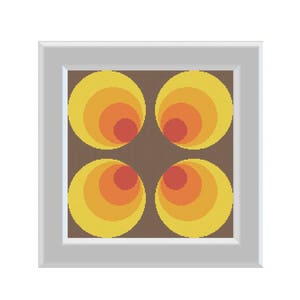 May include: A framed print with a retro design featuring four concentric circles in shades of yellow, orange, and red on a brown background.