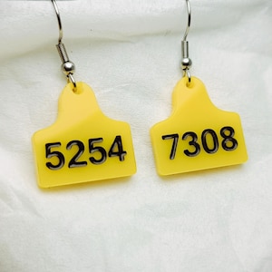 Cow numbers tags earrings yellow