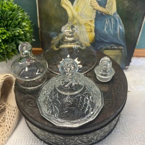 May include: A rustic wooden sign with the text "Welcome to our home" in white lettering. The sign features a distressed finish and a simple, inviting design, perfect for front door decor.