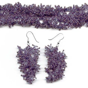 May include: A set of purple beaded jewelry featuring a bracelet and a pair of earrings. The bracelet and earrings are made with small, iridescent beads that create a delicate, lacy pattern.