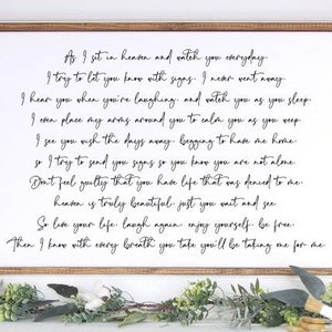 Pode incluir: Uma placa branca enquadrada com texto de caligrafia preta que diz: "As I sit in heaven and watch you everyday. I try to let you know with signs. I never went away. I hear you when you're laughing and watch you as you sleep. I even place my arms around you to calm you as you weep. I see you wish the days away, begging to have me home. So I try to send you signs so you know you are not alone. Don't feel guilty that you have life that was denied to me. Heaven is truly beautiful, just you wait and see. So live your life, laugh again, enjoy yourself, be free. Then I know with every breath you take you'll be taking me for me."