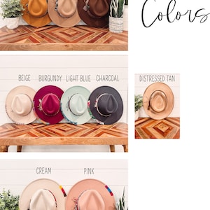 May include: A collection of ten felt hats in various colors, including cognac, khaki, brown, beige, burgundy, light blue, charcoal, distressed tan, cream, and pink. The hats are arranged in three rows on a wooden surface. The text "Hat Colors" is written in black cursive above the hats.
