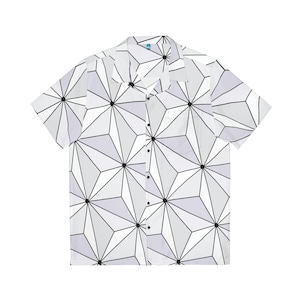 May include: A white short-sleeved button-up shirt with a geometric pattern in black and gray. The pattern is made up of overlapping stars.