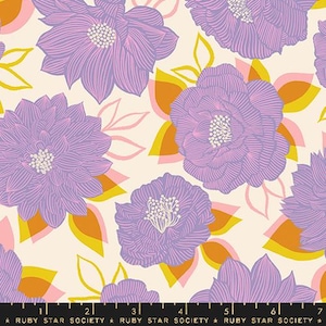 May include: Floral fabric with a repeating pattern of large, stylized purple flowers with white centers. The flowers are set against a cream background with orange, yellow, and pink leaf shapes. The text "RUBY STAR SOCIETY" is at the bottom.