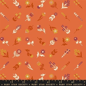 May include: A seamless fabric pattern featuring a variety of stylized floral designs in shades of orange, yellow, and purple on a coral background. The pattern includes flowers, leaves, and stems.