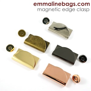 May include: Five magnetic edge clasps in different finishes: silver, brass, gold, black, and rose gold. Each clasp is a half-circle shape and comes with a matching magnetic button.