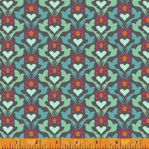 May include: A repeating pattern of teal, green, and pink hearts, birds, and bugs on a dark gray background. The pattern is shown on a fabric with a ruler for scale.